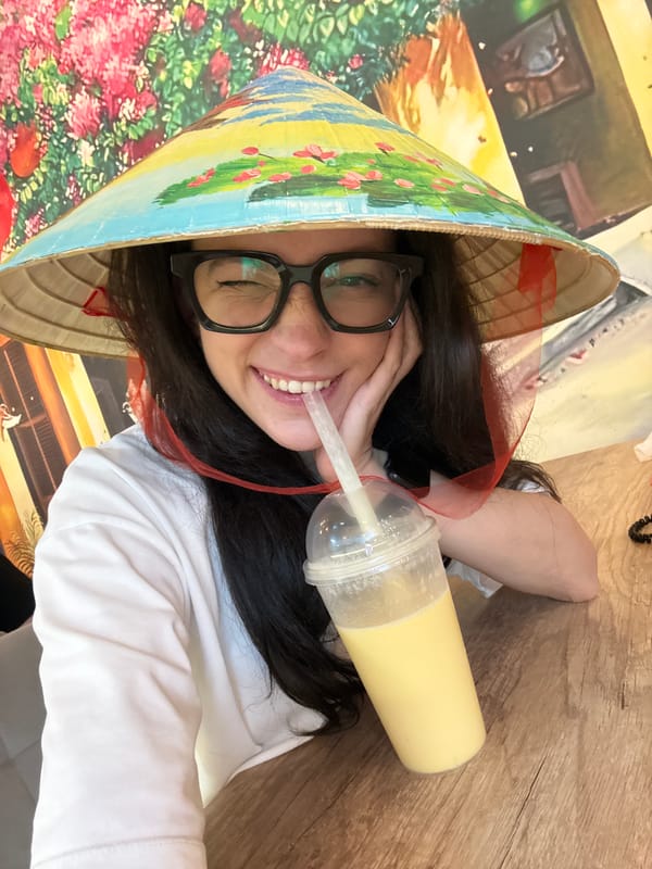 Vietnamese-themed café visit in Izhevsk, complete with hats and pho.