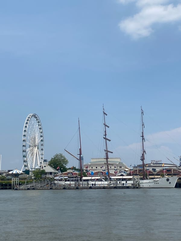 Tourist documents ferry ride along Bangkok's Chao Phraya River