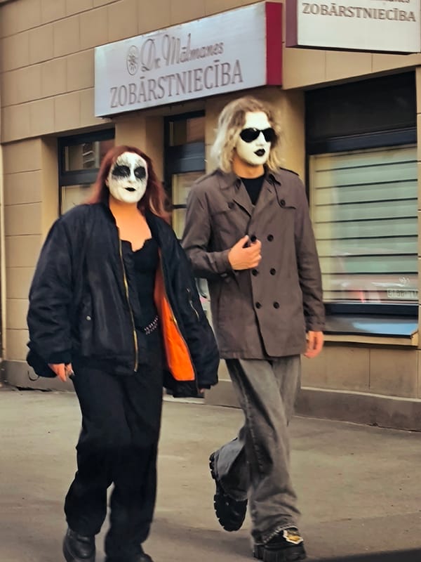 Face-painted pair spotted walking Riga streets