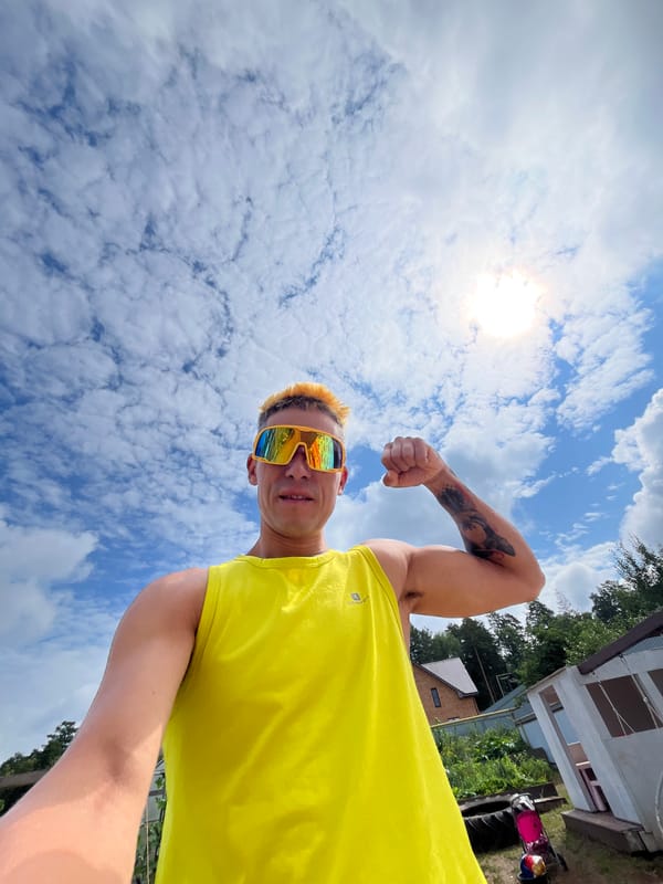 Tattooed flex in bold summer style, Chaikovsky, Russia.