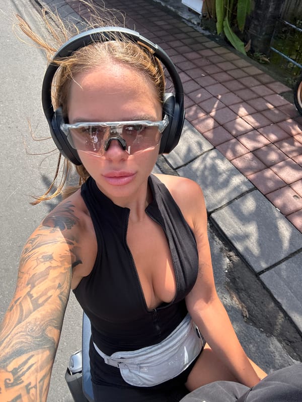 Woman with headphones spotted outdoors in North Kuta