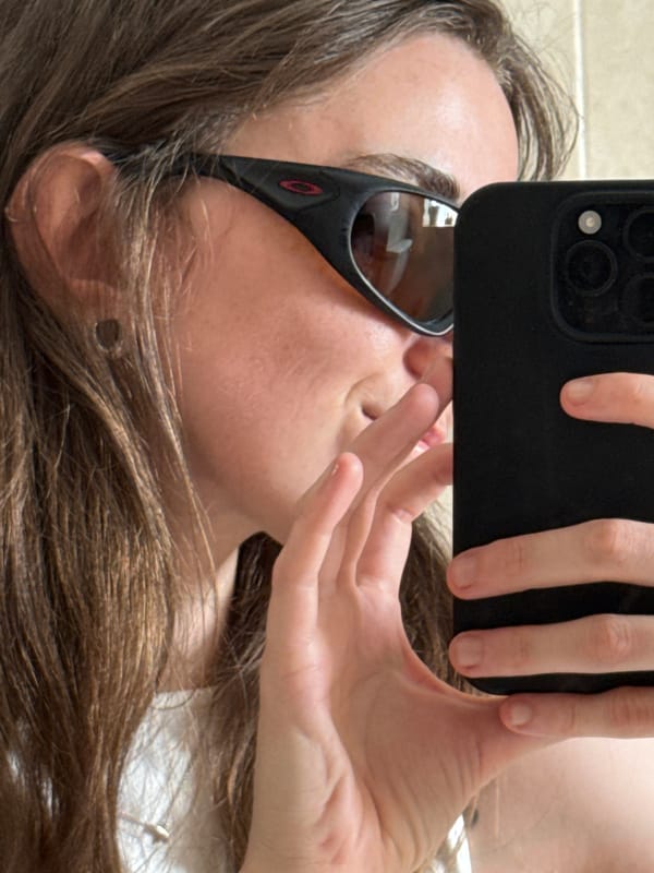 Upside-down selfie with Oakley shades in Ramat Gan