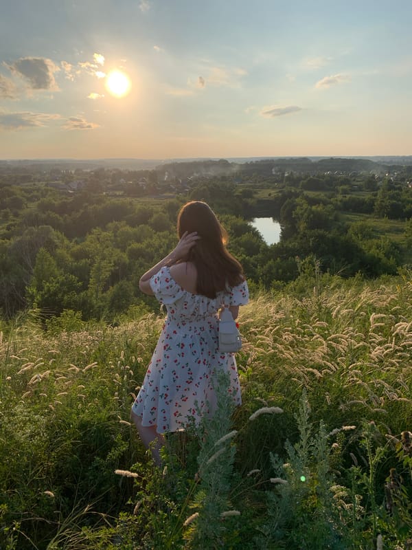 Summer afternoon snapshots: white dresses, pine trees, and a cat in a cap
