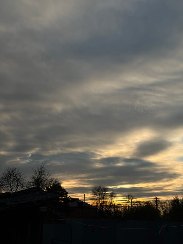 Golden twilight clouds observed over Komsomolskiy, Russia