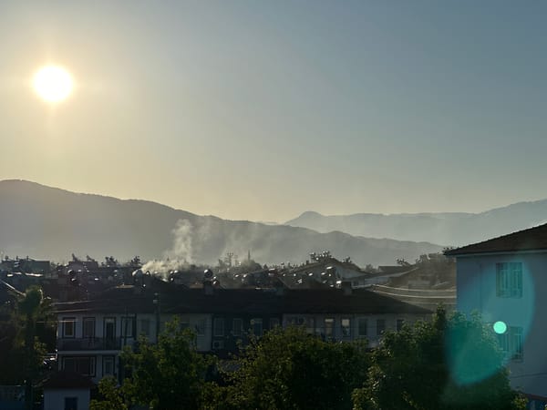Woman takes morning selfies in sunny Fethiye, Turkey