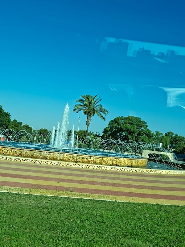 Sunny morning at a fountain park in Guardamar del Segura