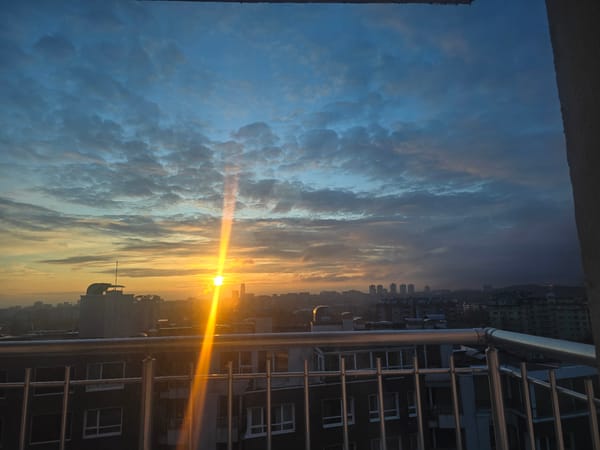 Sunrise captured over Sofia skyline from elevated viewpoints
