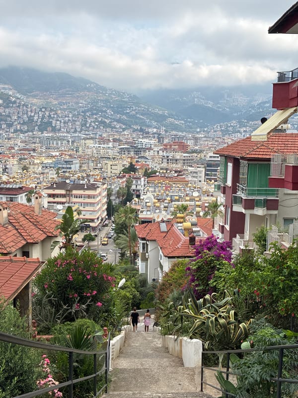 Tourist captures scenic views of Alanya cityscape and cable cars