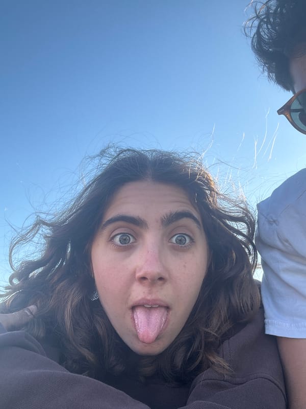 Woman takes playful selfie in Tel Aviv