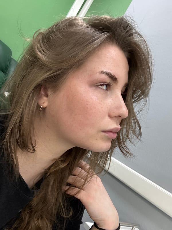 Woman takes multiple selfies in Chaikovsky, Russia morning session