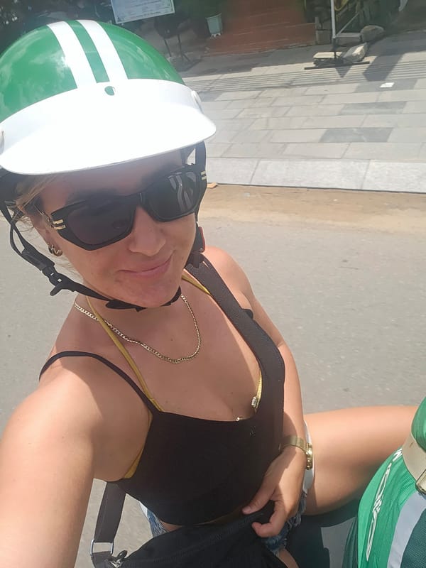 Motorcycle selfie on the move in Phu Thuy Ward