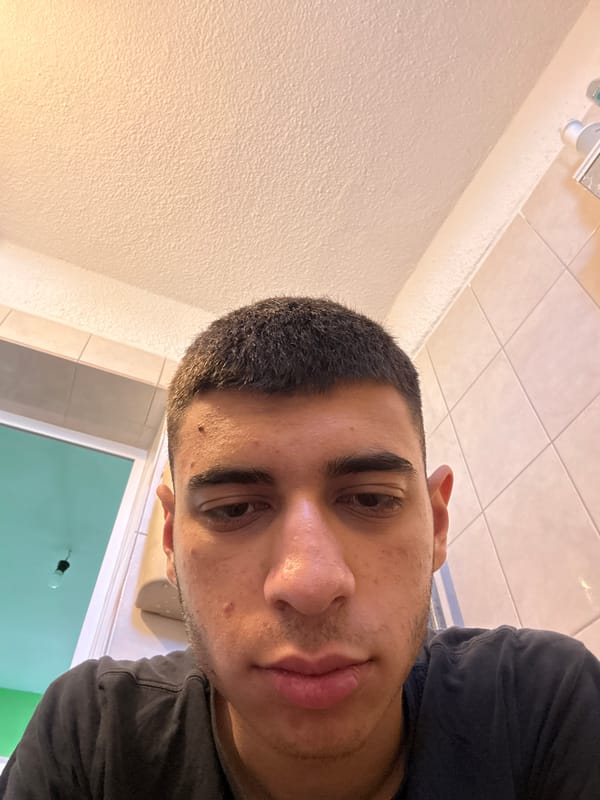 Young man takes bathroom selfie in Sofia, Bulgaria