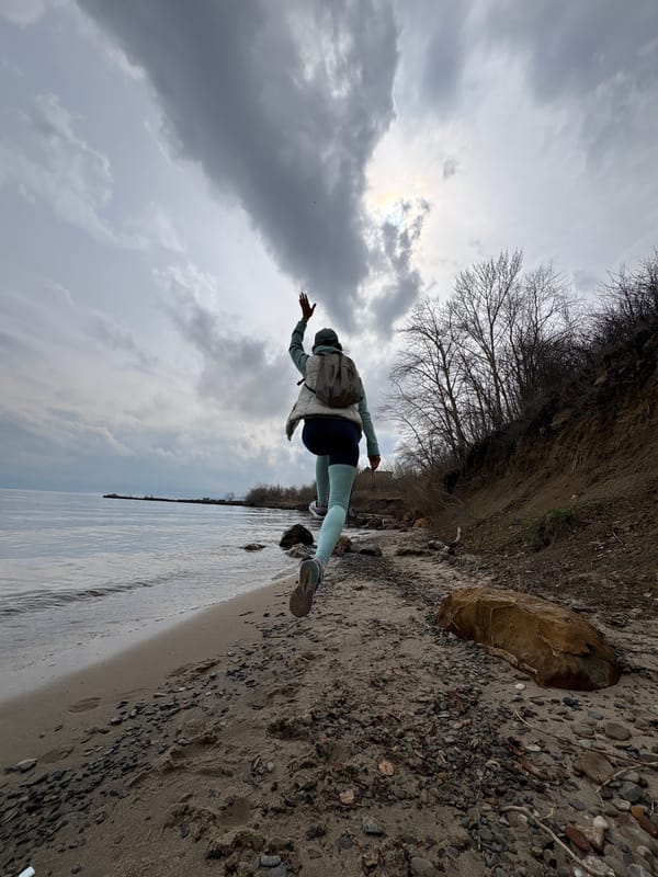 Woman exercises on Volga River beach in Ulyanovsk