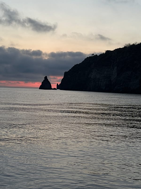 Dawn coastal scenes captured at Lipari pier, Italy
