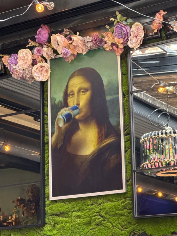 Diners eat at quirky Pleven restaurant with Mona Lisa art