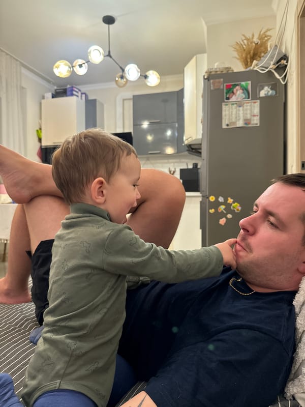 Father and child share tender moment in Odintsovo home