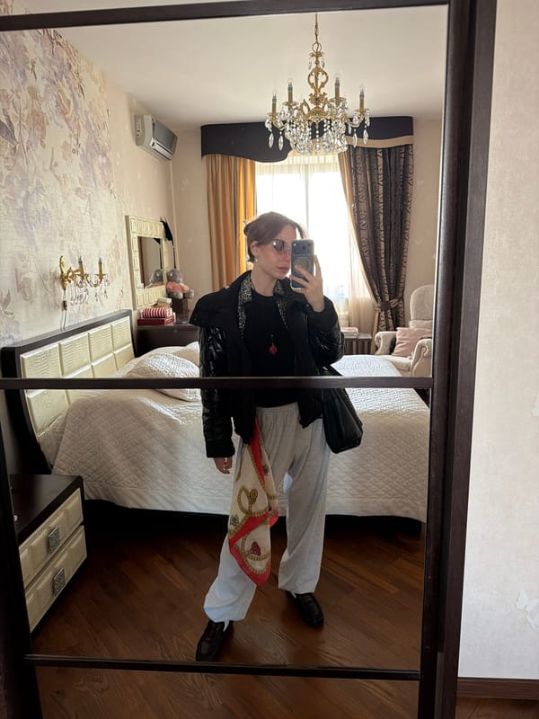 Woman takes selfies in elevator in Khimki, Russia