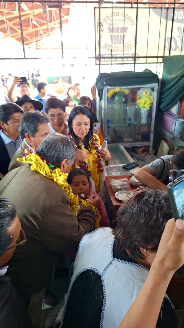 Crowded celebration honors older man at Arequipa market