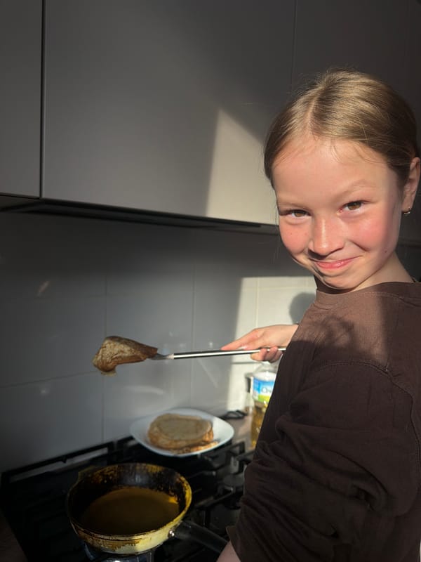 Domestic activities in Markovo: pancake cooking, pet interaction, painting