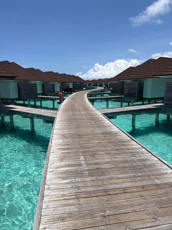 Tourist documents morning resort activities in Guraidhoo, Maldives