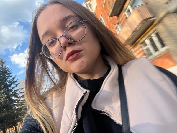 Woman takes outdoor selfie in Pushchino, Russia