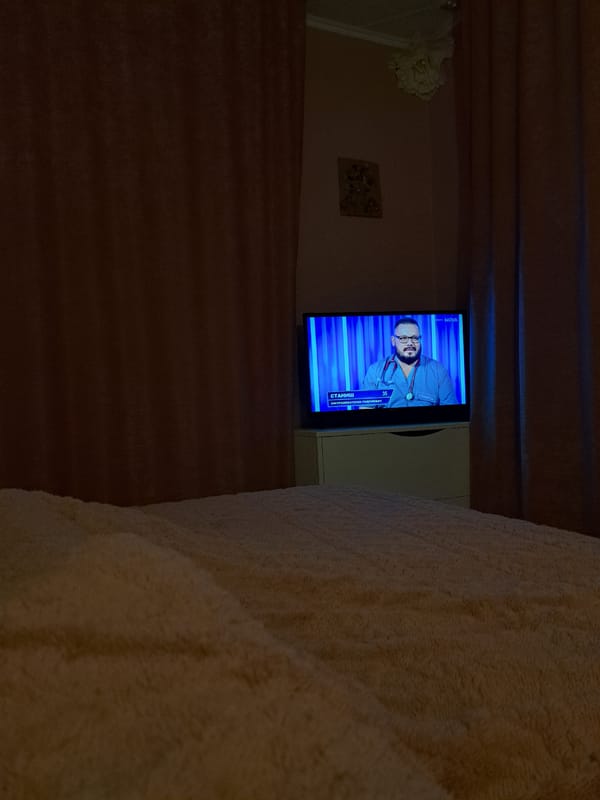 Healthcare professional appears on television in Bulgarian home