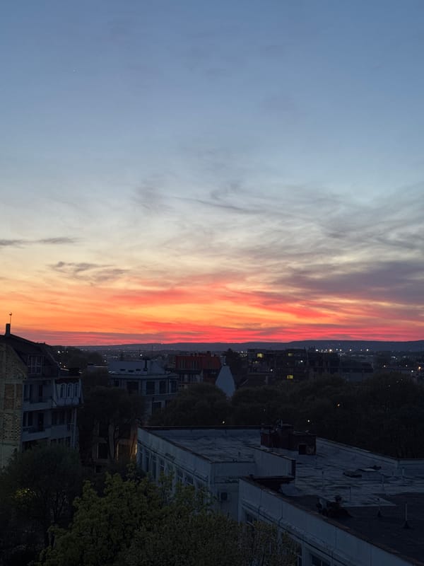 Vibrant sunset illuminates Varna, Bulgaria skyline April 23