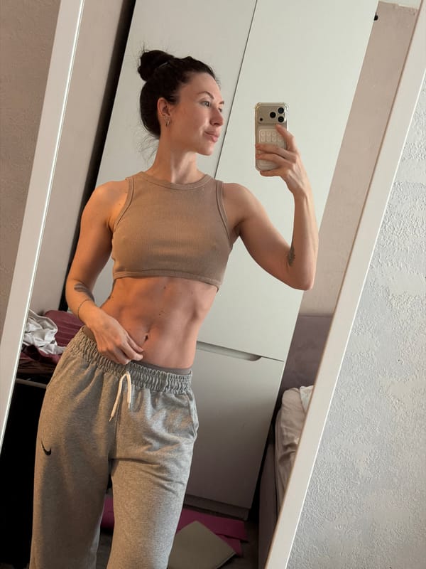 Woman Takes Mirror Selfie in Early Morning Perm