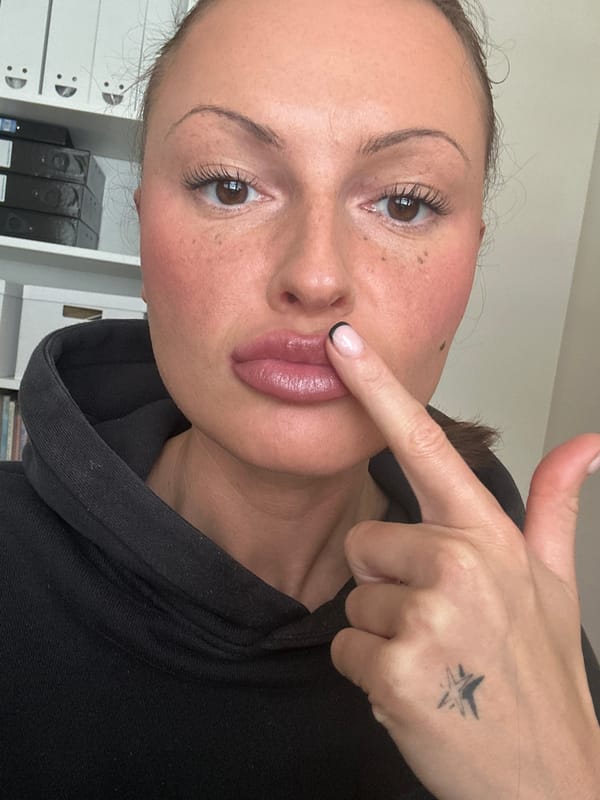 Woman makes shush gesture in Tunbridge Wells