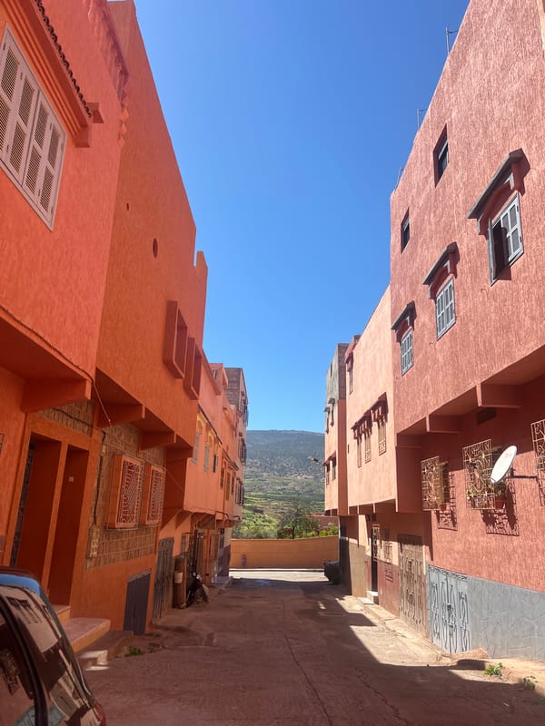 Person documents street scenes and selfies in Ouaouizert, Morocco