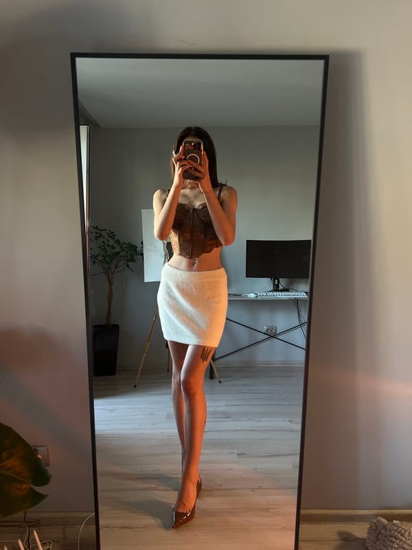 Outfit photos and mirror selfies at home in Ternopil, cats included