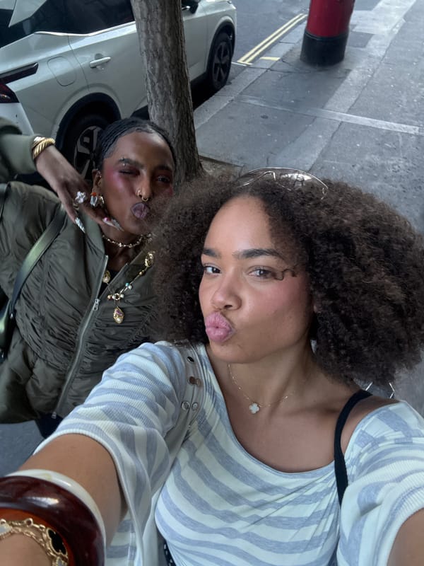 Selfie moment captured near modern London building Wednesday evening