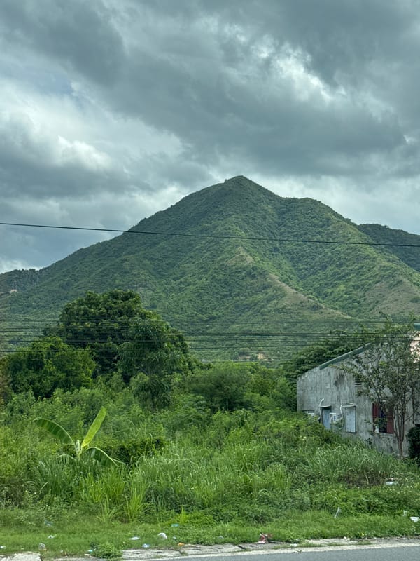 Cargo motorbike on a mountain road in Ninh Ích