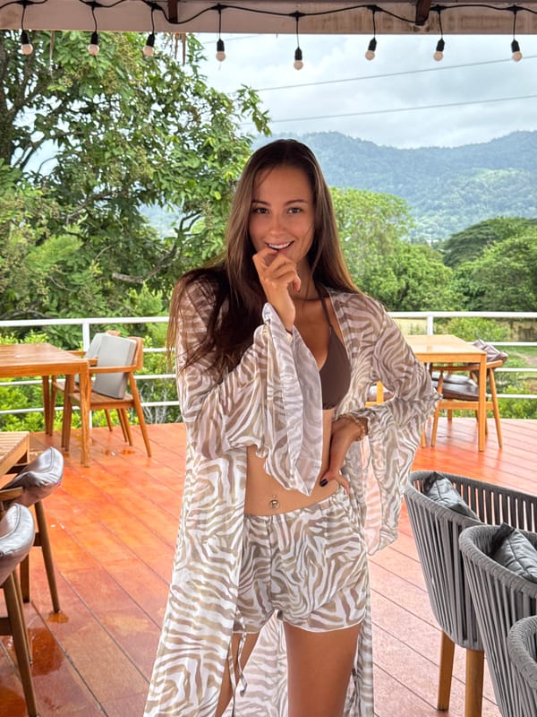 Woman poses on deck in Kathu, Thailand