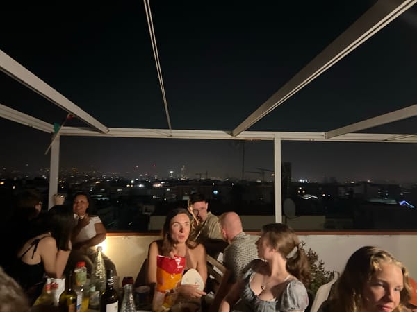 Barcelona rooftop crowd watches fireworks light up the night