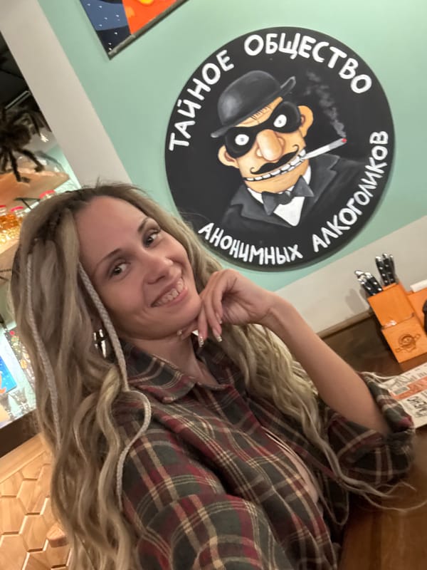 Woman poses for photo at Rusanovo establishment