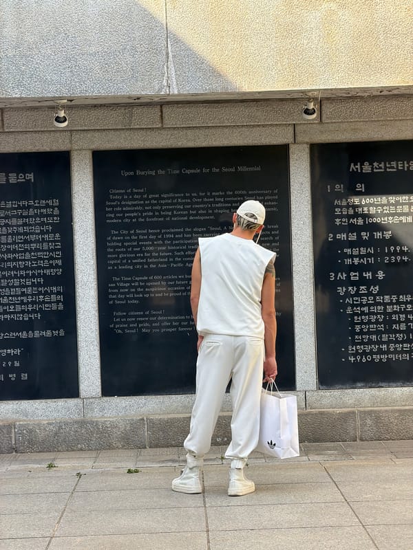 White-clad visitor tours Seoul memorial site Sunday morning