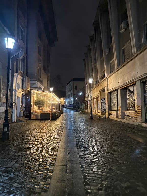 Nighttime street scenes captured across central Bucharest