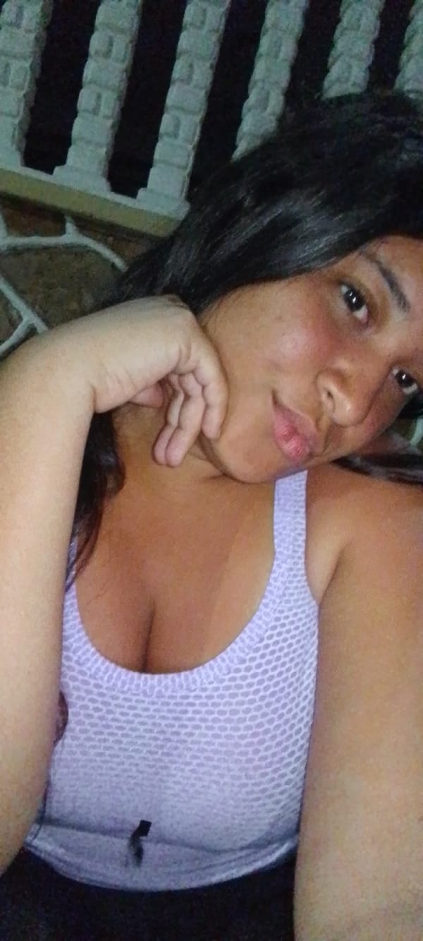 Woman takes selfie in La Cabrera, Venezuela