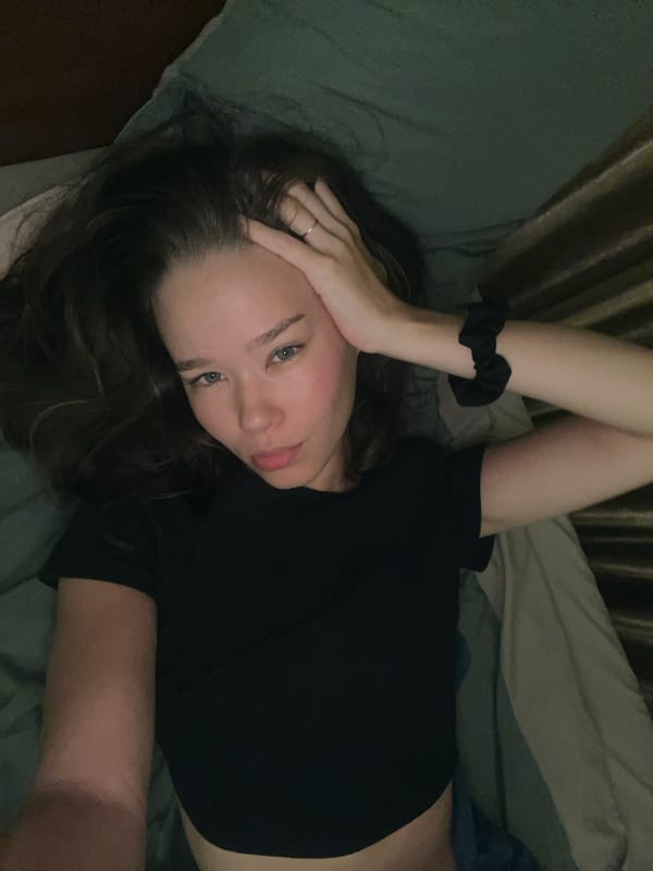 Woman resting in bed observed in Nha Trang