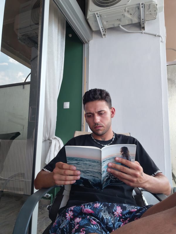 Slow afternoon in Aegio: beers, books, and a cruise ship