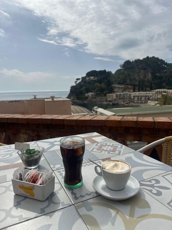 Morning café moment captured in Taormina, Italy