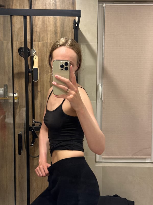 Person Takes Bathroom Selfie in Podshivalovo, Russia