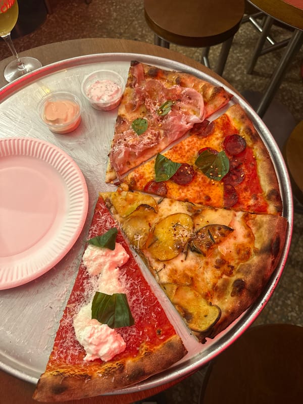 Pizza dinner documented in Milan Sunday evening