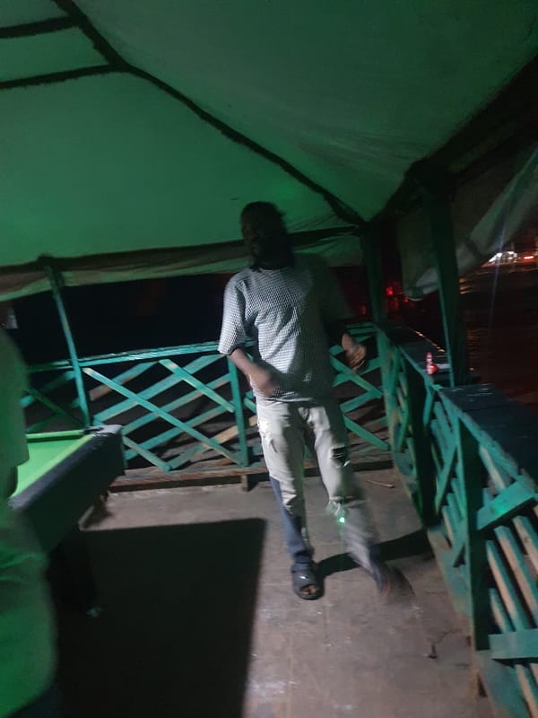 Evening pool sessions at an outdoor billiard spot in Lokoja