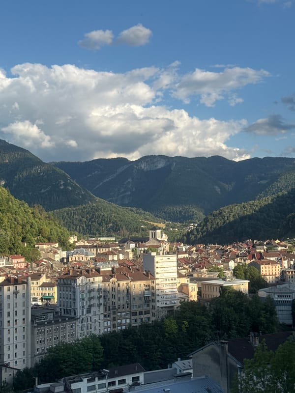Afternoon in Saint-Claude: valley town, train station, mountain views