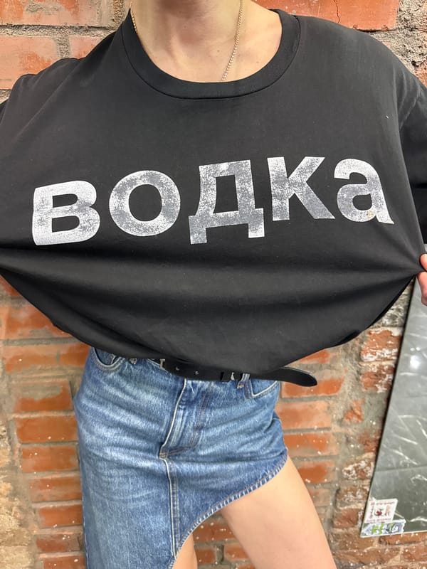 Woman spotted wearing vodka-themed shirt in Moscow