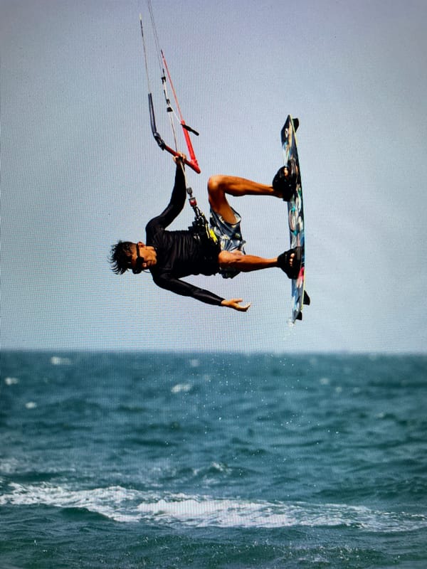 Kitesurfer performs aerial tricks off Bacong, Philippines coast