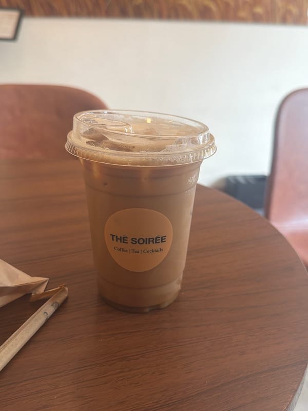Iced coffee and Midtown streets on a July afternoon