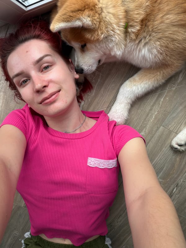 Woman and dog share quiet morning moments in Chaikovsky